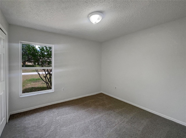 3090 Yorkshire Dr, Deltona, FL 32738 - carpeted spare room with a textured ceiling and baseboards
