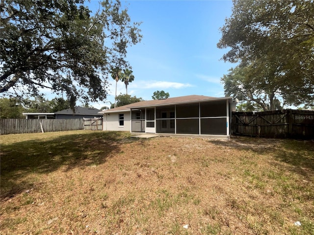 3090 Yorkshire Dr, Deltona, FL 32738 - back of house featuring a sunroom