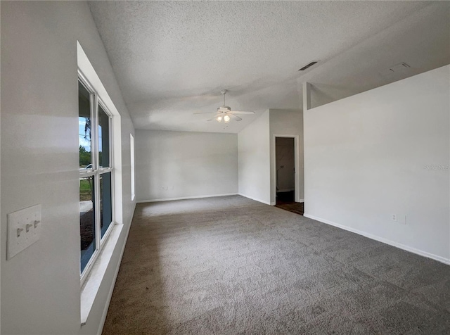 3090 Yorkshire Dr, Deltona, FL 32738 - unfurnished room featuring ceiling fan, vaulted ceiling, baseboards, carpet flooring, and a textured ceiling