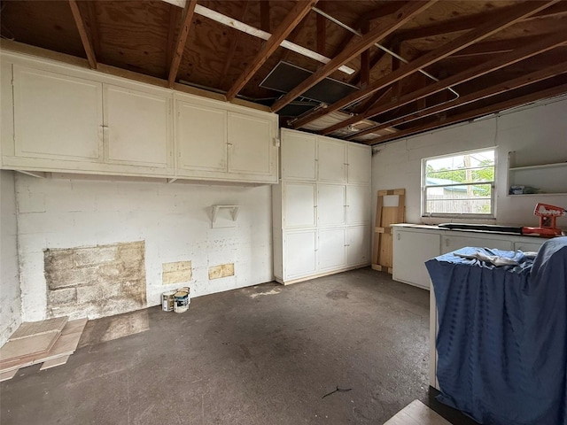 6615 Beamer Way, Orlando, FL 32807 - misc room featuring a garage and concrete floors