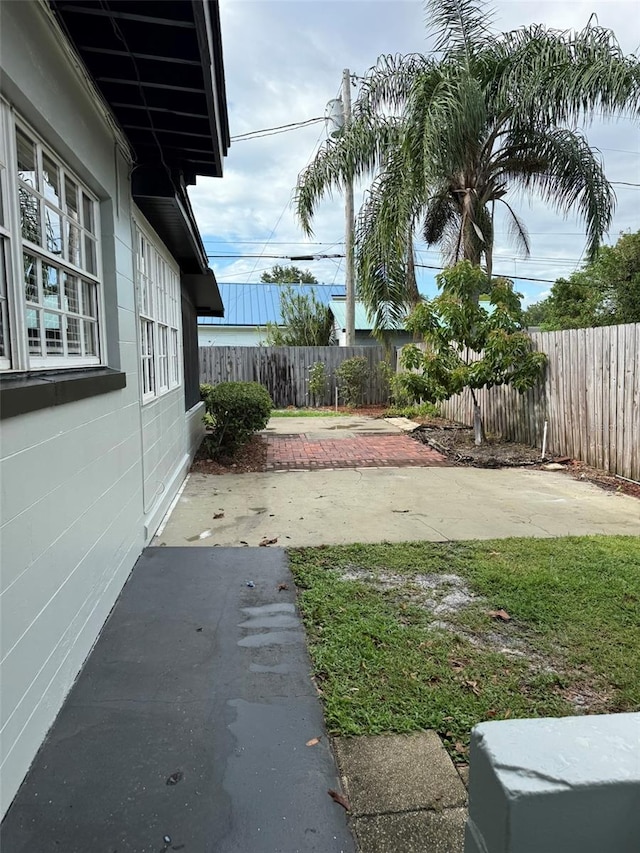 6615 Beamer Way, Orlando, FL 32807 - fenced backyard with a patio