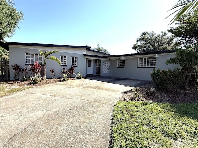 6615 Beamer Way, Orlando, FL 32807 - single story home featuring concrete driveway and stucco siding