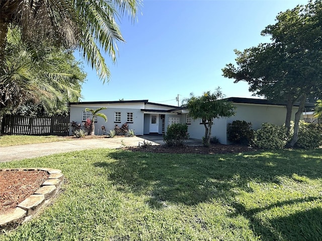 6615 Beamer Way, Orlando, FL 32807 - single story home with concrete driveway and stucco siding