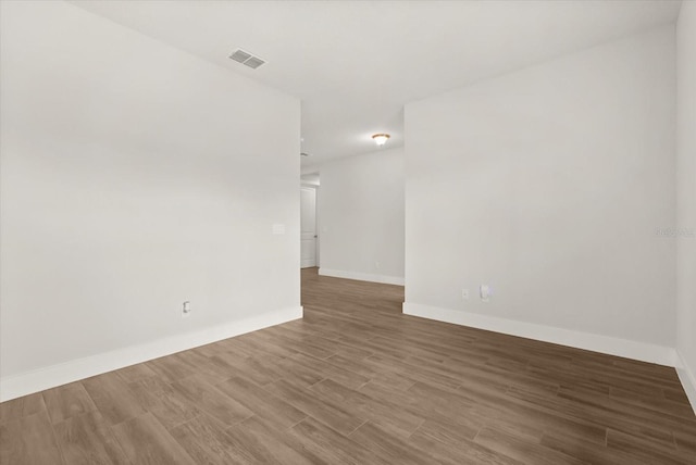 3635 Arbordale Loop, Sanford, FL 32771 - spare room with wood finished floors and baseboards