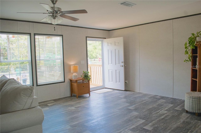3790 NW 4th Ave, Okeechobee, FL 34972 - living area with wood finished floors and a ceiling fan