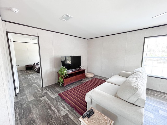 3790 NW 4th Ave, Okeechobee, FL 34972 - living room with wood finished floors and a decorative wall