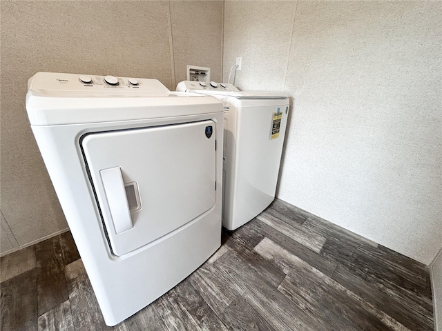 3790 NW 4th Ave, Okeechobee, FL 34972 - washroom with washer and dryer and dark wood-style flooring