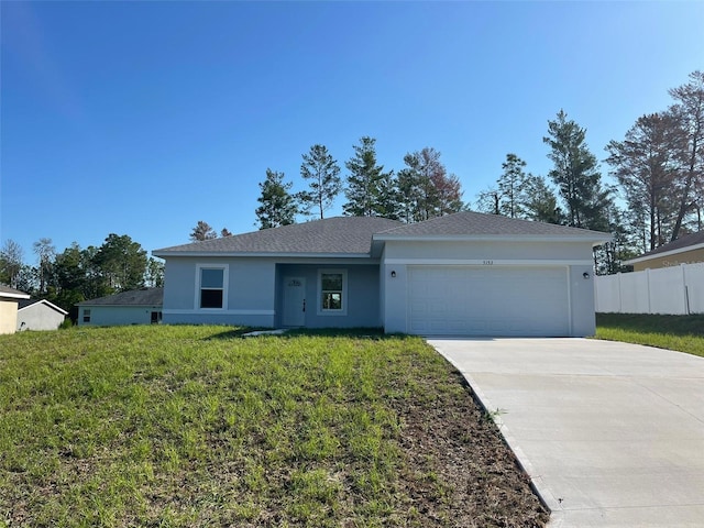 5153 SW 159th St, Ocala, FL 34473 - ranch-style home with stucco siding, an attached garage, driveway, and a shingled roof