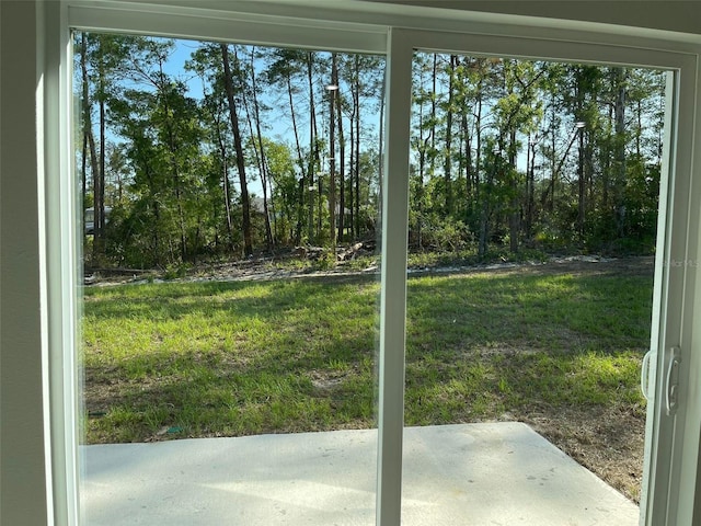 5153 SW 159th St, Ocala, FL 34473 - view of green lawn with a patio area