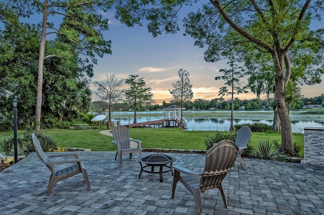 277 Sunrise Pt, Lake Mary, FL 32746 - view of patio / terrace featuring an outdoor fire pit and a water view