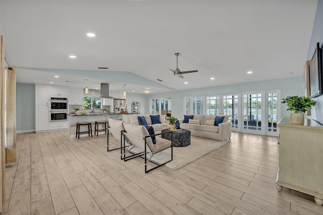 277 Sunrise Pt, Lake Mary, FL 32746 - living area featuring a ceiling fan, light wood-style flooring, recessed lighting, and lofted ceiling