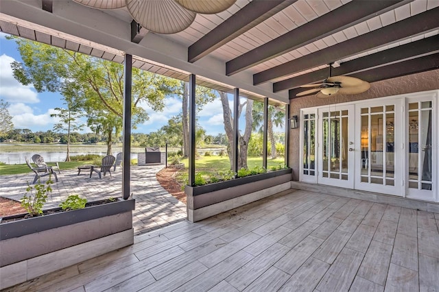 277 Sunrise Pt, Lake Mary, FL 32746 - unfurnished sunroom with ceiling fan, a water view, french doors, and beamed ceiling