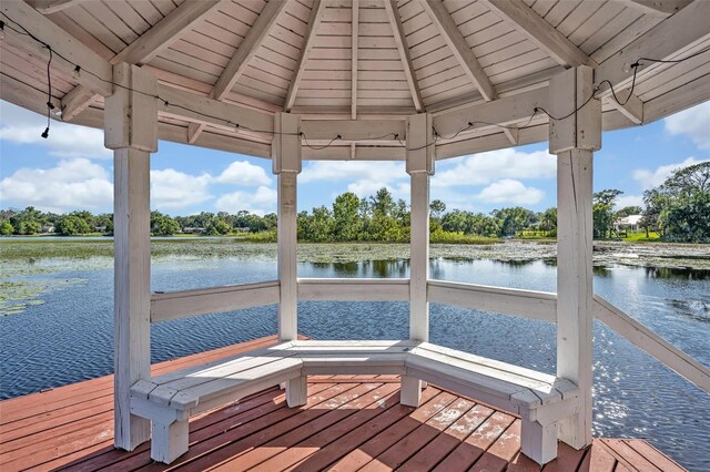 277 Sunrise Pt, Lake Mary, FL 32746 - dock featuring a water view, a gazebo, and view of wooded area