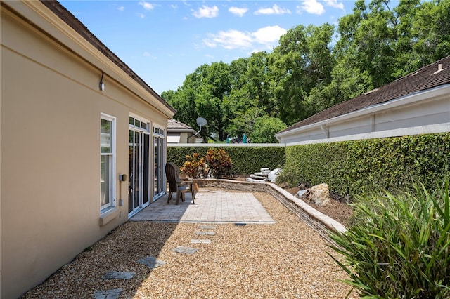 5973 Chesapeake Park Unit 58, Orlando, FL 32819 - fenced backyard with a patio area