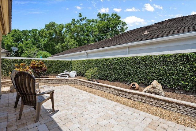 5973 Chesapeake Park Unit 58, Orlando, FL 32819 - fenced backyard featuring a patio area