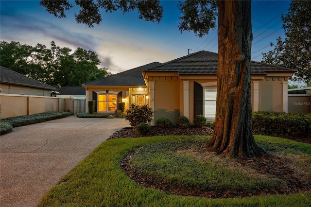5973 Chesapeake Park Unit 58, Orlando, FL 32819 - ranch-style home featuring stucco siding and concrete driveway