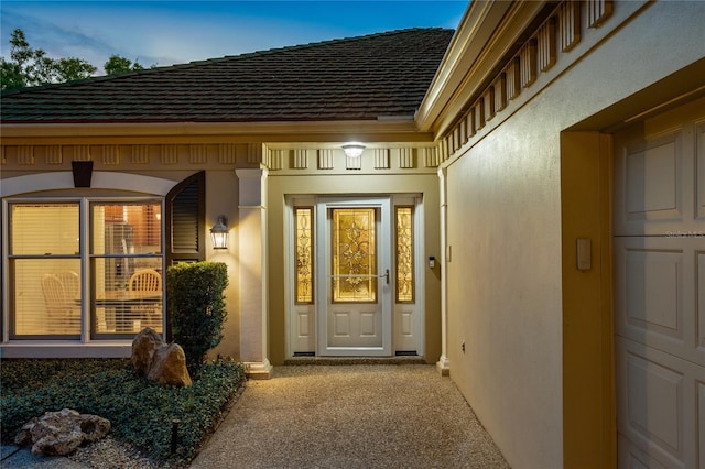 5973 Chesapeake Park Unit 58, Orlando, FL 32819 - property entrance featuring stucco siding and a shingled roof
