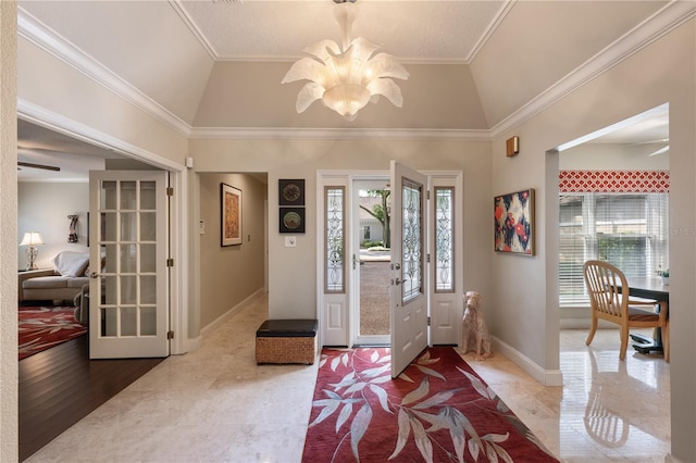5973 Chesapeake Park Unit 58, Orlando, FL 32819 - foyer entrance featuring vaulted ceiling and crown molding