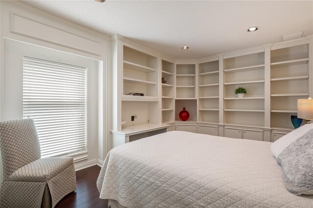 5973 Chesapeake Park Unit 58, Orlando, FL 32819 - bedroom featuring dark wood-type flooring and recessed lighting