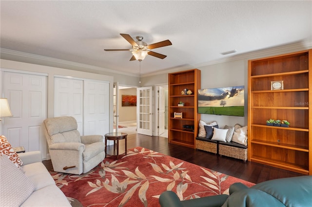 5973 Chesapeake Park Unit 58, Orlando, FL 32819 - living area featuring french doors, ceiling fan, wood-type flooring, and crown molding