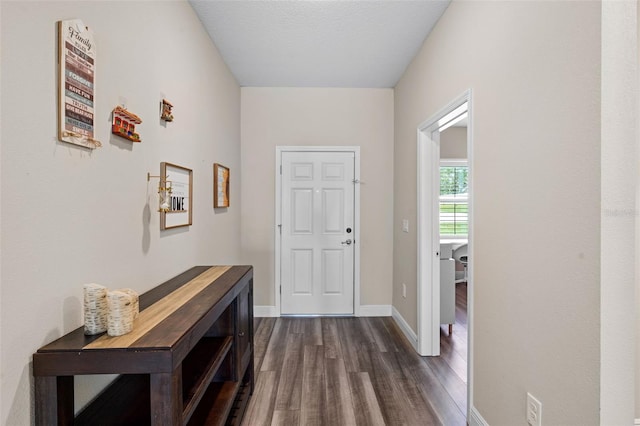 4811 SW 108th Place Rd, Ocala, FL 34476 - entryway featuring dark wood-type flooring and baseboards