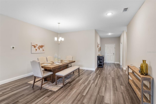 4811 SW 108th Place Rd, Ocala, FL 34476 - dining space with wood finished floors, baseboards, a chandelier, and recessed lighting