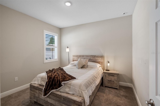 4811 SW 108th Place Rd, Ocala, FL 34476 - bedroom with dark colored carpet and baseboards