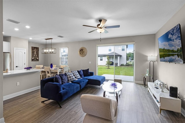 7745 Somersworth Dr, Kissimmee, FL 34747 - living room with recessed lighting, wood finished floors, baseboards, and ceiling fan