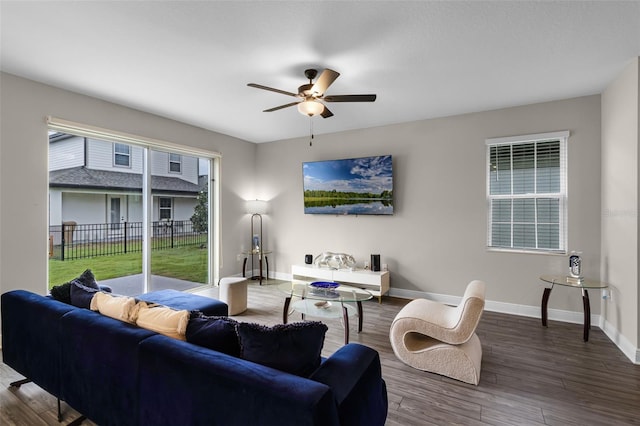 7745 Somersworth Dr, Kissimmee, FL 34747 - living room with ceiling fan, baseboards, and wood finished floors