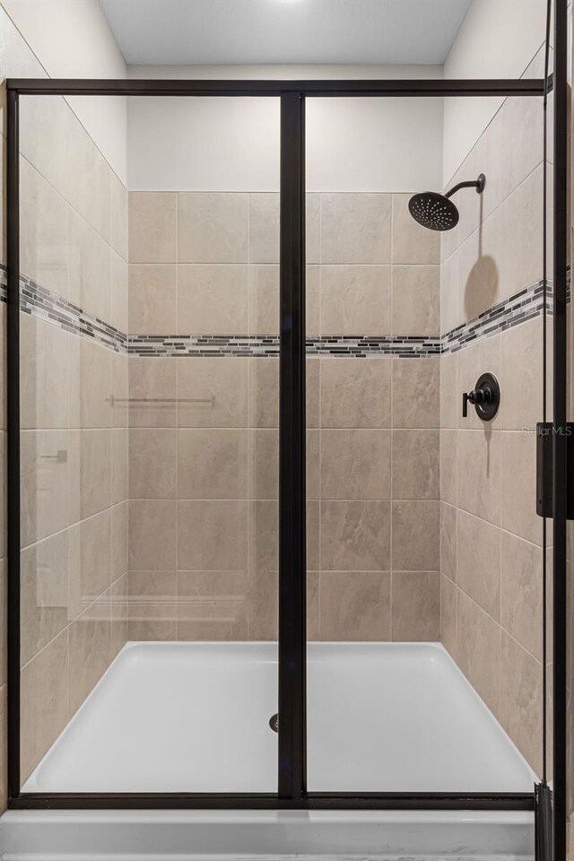 7745 Somersworth Dr, Kissimmee, FL 34747 - bathroom featuring a stall shower
