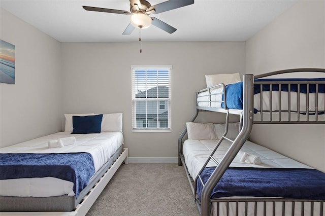7745 Somersworth Dr, Kissimmee, FL 34747 - bedroom with carpet flooring, ceiling fan, and baseboards