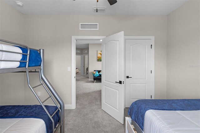 7745 Somersworth Dr, Kissimmee, FL 34747 - carpeted bedroom with ceiling fan and baseboards