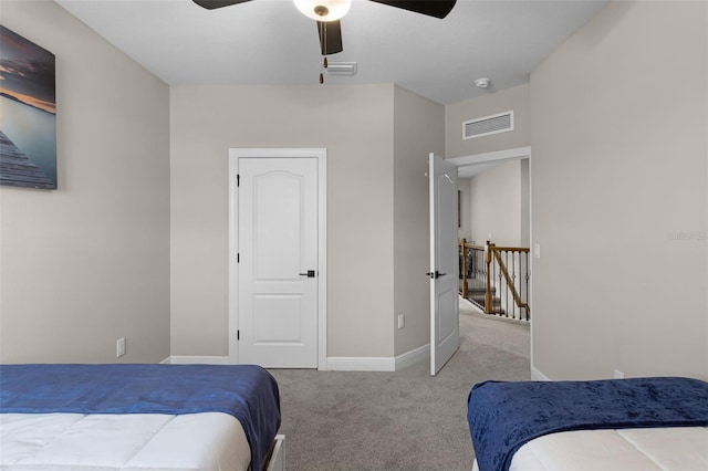7745 Somersworth Dr, Kissimmee, FL 34747 - carpeted bedroom with baseboards and ceiling fan