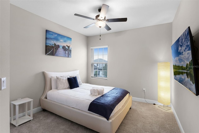 7745 Somersworth Dr, Kissimmee, FL 34747 - carpeted bedroom featuring baseboards and a ceiling fan