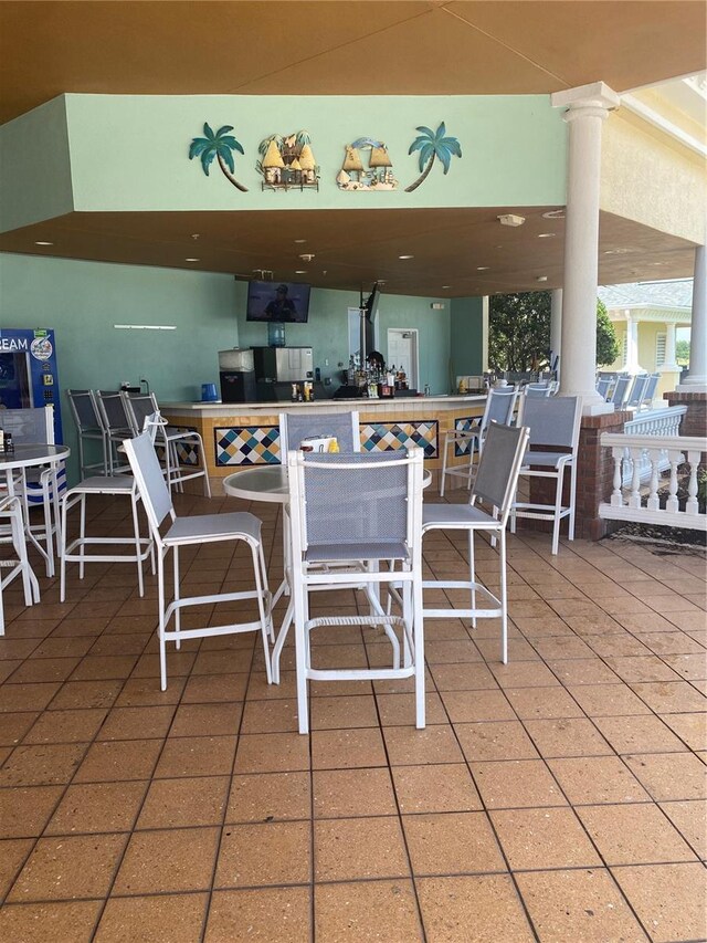 7745 Somersworth Dr, Kissimmee, FL 34747 - view of patio / terrace featuring an outdoor bar