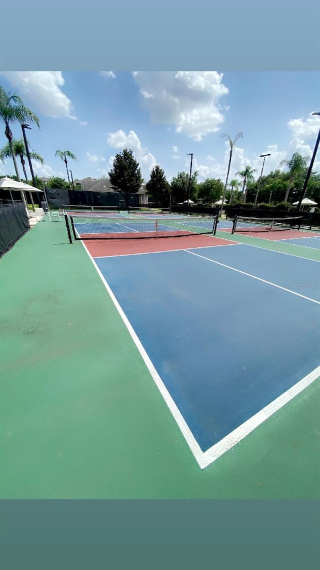 7745 Somersworth Dr, Kissimmee, FL 34747 - view of tennis court featuring community basketball court