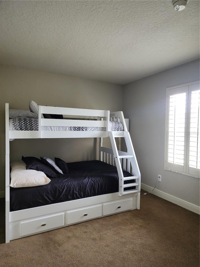 3500 Calabria Ave, Davenport, FL 33897 - bedroom featuring carpet, a textured ceiling, and baseboards