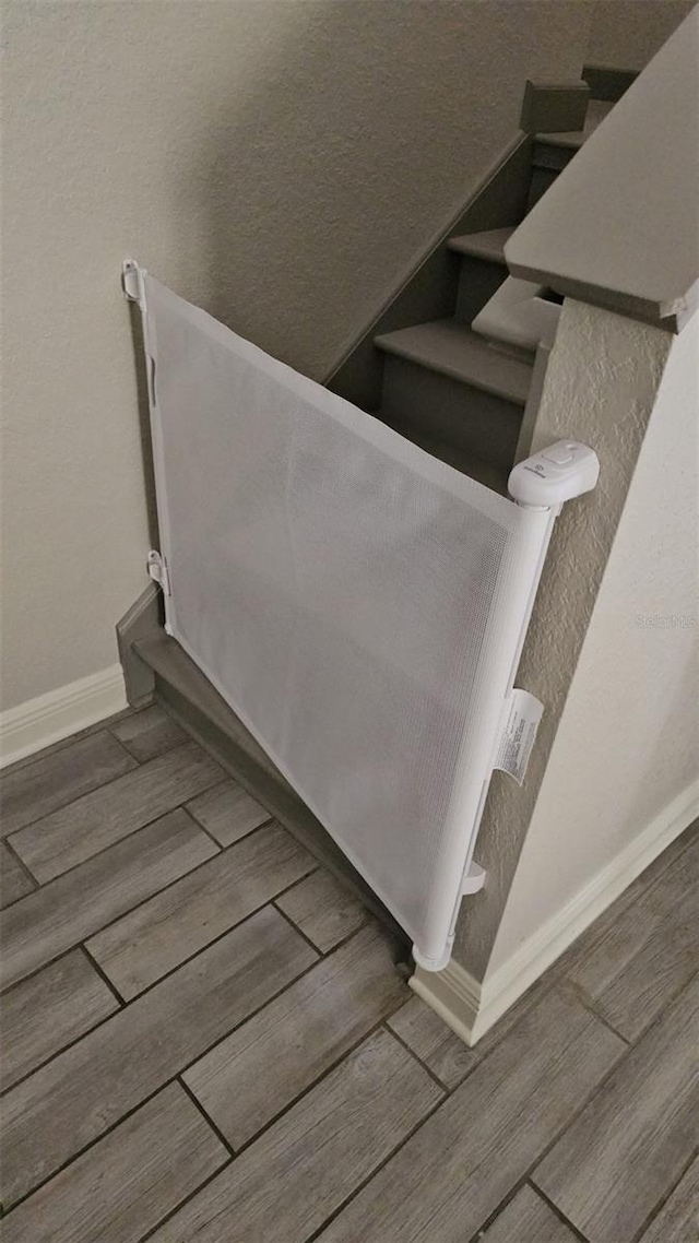 3500 Calabria Ave, Davenport, FL 33897 - stairway featuring wood finished floors and baseboards