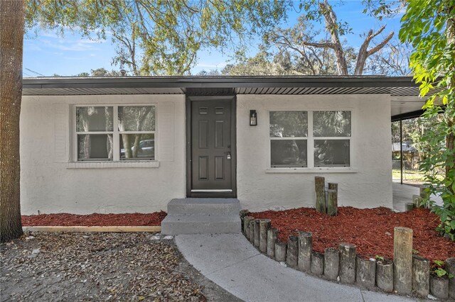 11572 SE 60th Ave, Belleview, FL 34420 - entrance to property with stucco siding