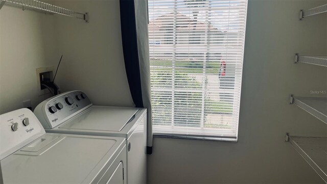 washroom featuring independent washer and dryer