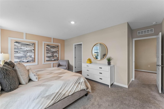bedroom featuring carpet floors and baseboards