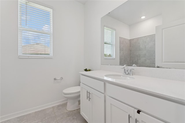 6139 Claystone Way, Mount Dora, FL 32757 - bathroom with baseboards, vanity, toilet, and tile patterned floors