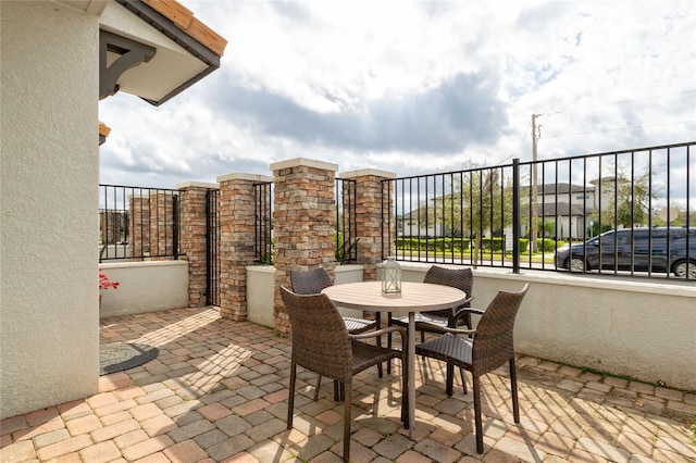 109 Kenny Blvd, Haines City, FL 33844 - view of patio with fence and outdoor dining space