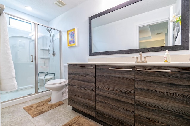 109 Kenny Blvd, Haines City, FL 33844 - full bathroom with toilet, a stall shower, tile patterned floors, and vanity
