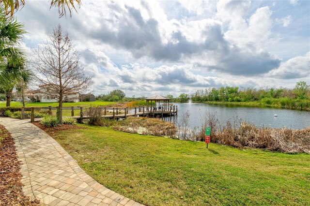 109 Kenny Blvd, Haines City, FL 33844 - dock with a water view, a lawn, and a gazebo