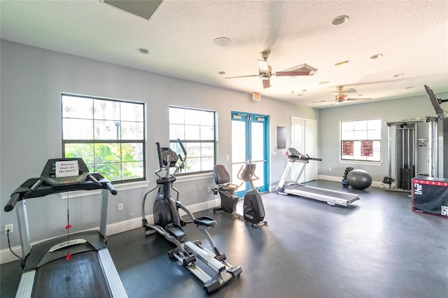 109 Kenny Blvd, Haines City, FL 33844 - gym featuring ceiling fan, baseboards, and a textured ceiling
