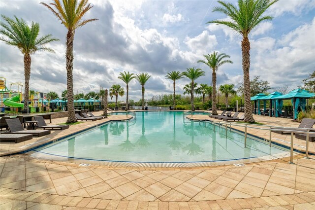 109 Kenny Blvd, Haines City, FL 33844 - community pool with a patio