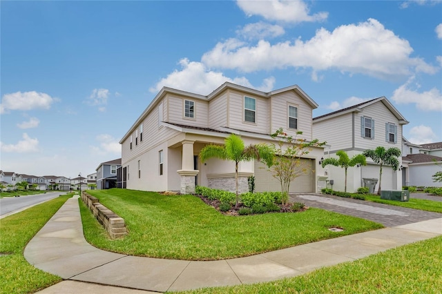 1221 Aloha Blvd, Davenport, FL 33897 - view of front of property with driveway, an attached garage, a front lawn, stucco siding, and a residential view