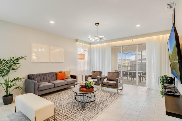 1221 Aloha Blvd, Davenport, FL 33897 - living room with a chandelier, recessed lighting, and light tile patterned flooring