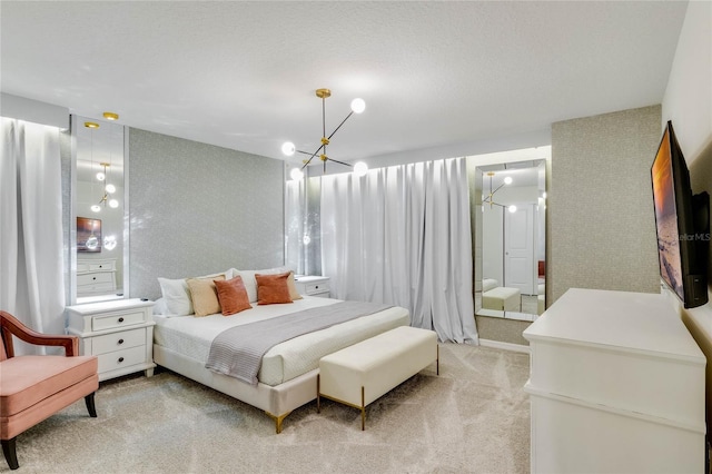 1221 Aloha Blvd, Davenport, FL 33897 - bedroom featuring a chandelier and light carpet
